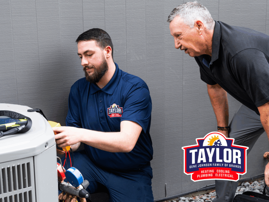 A Taylor HVAC technician performing maintenance on a central AC outdoor unit.